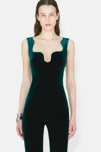 Tailored Siren Velvet jumpsuit is defined by a softly scalloped neckline.